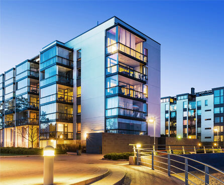 Evening outdoor urban view of modern real estate homes