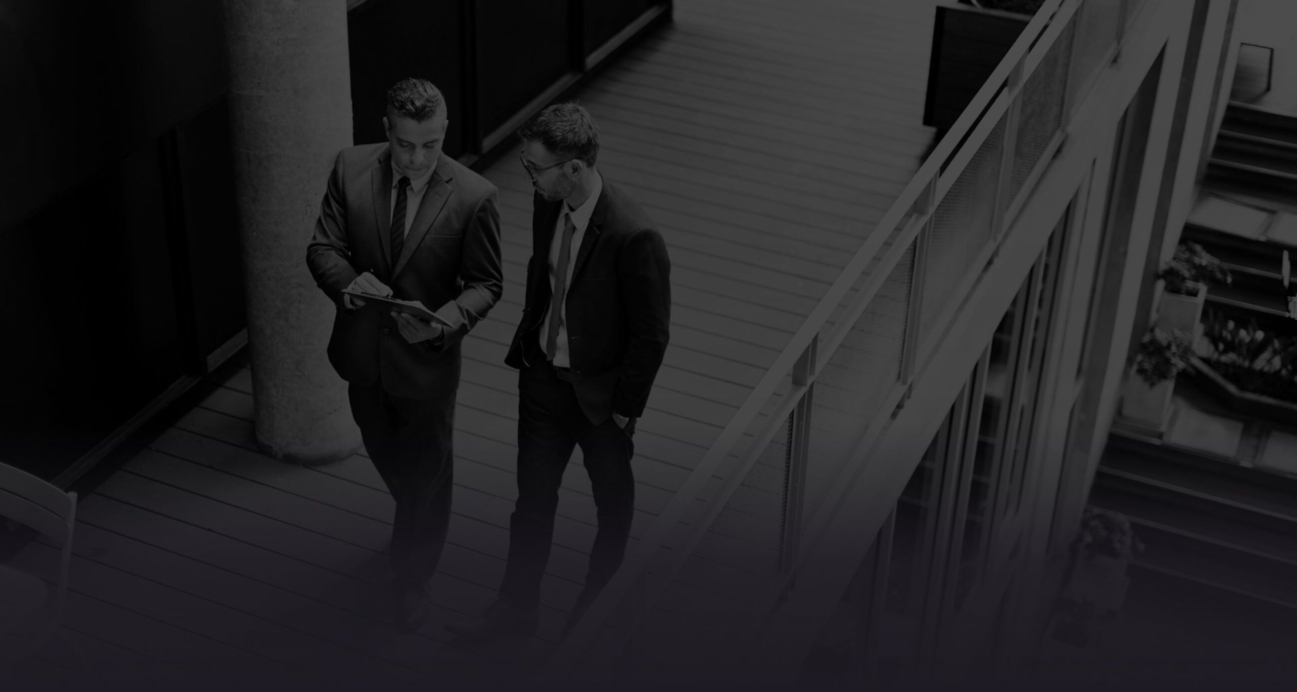 Businessmen walking and talking